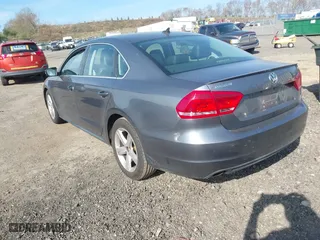2013 Volkswagen Passat SE with VIN 1VWBP7A36DC039148, listed as a IAAI auction lot 42075823 with 196,734 mi miles. Bid and sale history available at carsss.com. Image 3.