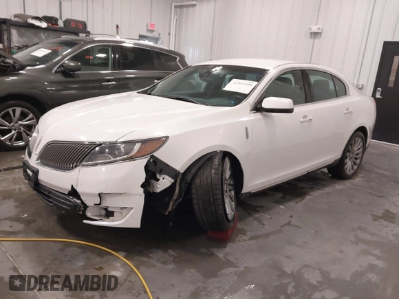 2014 Lincoln MKS with VIN 1LNHL9EK5EG605750, listed as a IAAI auction lot 41565308 with 167,835 mi miles. Bid and sale history available at carsss.com. Image 17.