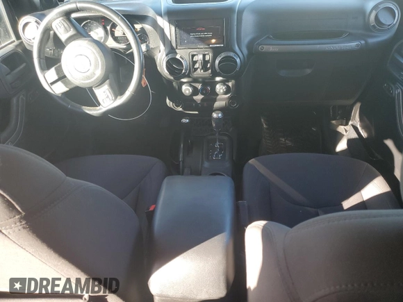 2014 Jeep Wrangler Unlimited Sport with VIN 1C4BJWDG2EL319714, listed as a Copart auction lot 47924575 with 129,294 mi miles and Salvage Title. Bid and sale history available at DreamBid. Image 8.
