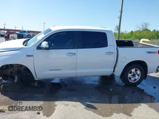 2012 Toyota Tundra 4WD Truck LTD with VIN 5TFHW5F1XCX269682, listed as a IAAI auction lot 41968019 with 166,074 mi miles. Bid and sale history available at carsss.com. Image 15.