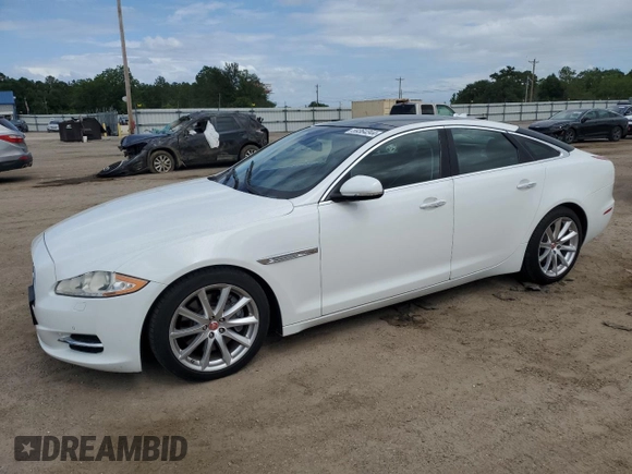2015 Jaguar XJ with VIN SAJWA1CZ9F8V82974, listed as a Copart auction lot 59364344 with 64,012 mi miles and Salvage Title. Bid and sale history available at carsss.com. Image 1.