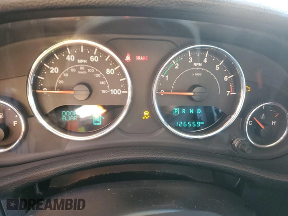 2018 Jeep Wrangler JK Unlimited Sport S with VIN 1C4BJWDG5JL909903, listed as a Copart auction lot 83998564 with 126,559 mi miles and Salvage Title. Bid and sale history available at carsss.com. Image 9.