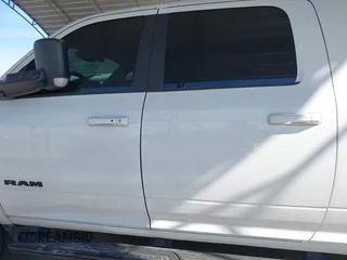 2021 Ram 2500 Laramie with VIN 3C6UR5NLXMG677847, listed as a IAAI auction lot 40992410 with 106,912 mi miles. Bid and sale history available at carsss.com. Image 14.