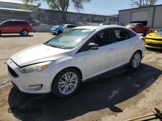 2015 Ford Focus Titanium с VIN 1FADP3J23FL300126, выставлен на аукционе Copart как лот 54434165 с пробегом 176 526 миль миль и Списание • Salvage title. История ставок и продаж доступна на DreamBid. Изображение 1.