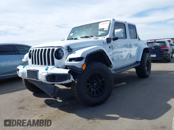 2021 Jeep Wrangler Unlimited Sahara with VIN 1C4JJXP63MW716690, listed as a IAAI auction lot 42087879 with 40,889 mi miles and . Bid and sale history available at DreamBid. Image 17.