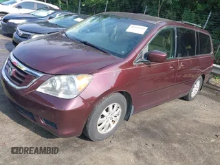 2010 Honda Odyssey EX with VIN 5FNRL3H59AB103405, listed as a IAAI auction lot 42442253 with 129,784 mi miles and . Bid and sale history available at DreamBid. Image 2.