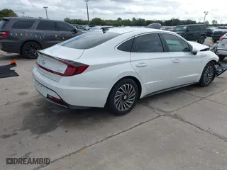 2021 Hyundai Sonata Hybrid SEL with VIN KMHL34JJ4MA026390, listed as a IAAI auction lot 41136913 with 32,439 mi miles. Bid and sale history available at carsss.com. Image 4.