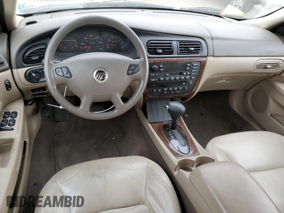 2002 Mercury Sable LS Premium z VIN 1MEFM59S52A640037, wystawiony jako Copart lot #77318134 z przebiegiem 137 836 mil mil oraz Szkody całkowita. Historia ofert i sprzedaży dostępna na DreamBid. Obrazek 8.