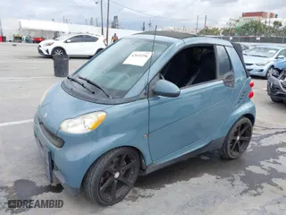 2008 Smart fortwo Passion with VIN WMEEK31X28K158970, listed as a IAAI auction lot 42073256 with 66,703 mi miles. Bid and sale history available at carsss.com. Image 2.