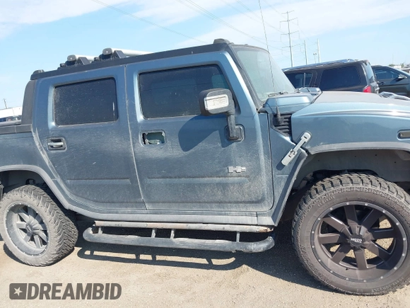 2006 Hummer H2 with VIN 5GRGN22U06H103326, listed as a IAAI auction lot 41474829 with 217,436 mi miles. Bid and sale history available at carsss.com. Image 13.
