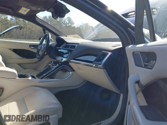 2020 Jaguar I-Pace SE with VIN SADHC2S12L1F87240, listed as a IAAI auction lot 41489254 with 58,359 mi miles and . Bid and sale history available at DreamBid. Image 5.