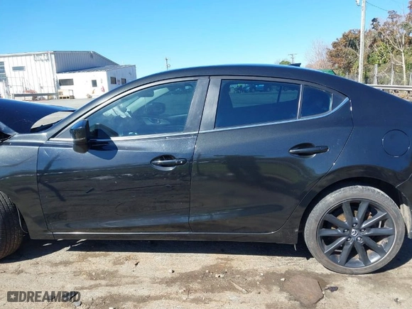 2018 Mazda Mazda3 4-Door Touring with VIN 3MZBN1V31JM169958, listed as a IAAI auction lot 41863165 with 64,082 mi miles. Bid and sale history available at carsss.com. Image 14.