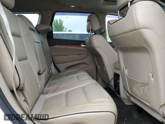 2011 Jeep Grand Cherokee Overland with VIN 1J4RR6GT9BC696319, listed as a Copart auction lot 56914185 with 211,661 mi miles and Salvage title. Bid and sale history available at DreamBid. Image 11.