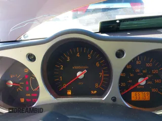 2004 Nissan 350Z Touring z VIN JN1AZ36A24T000472, wystawiony jako IAAI lot #38684053 z przebiegiem 65 769 mil mil oraz . Historia ofert i sprzedaży dostępna na DreamBid. Obrazek 7.