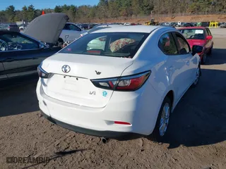 2018 Toyota Yaris iA with VIN 3MYDLBYV1JY330016, listed as a IAAI auction lot 40892299 with 87,813 mi miles. Bid and sale history available at carsss.com. Image 4.