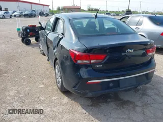 2021 Kia Rio S with VIN 3KPA24AD5ME414282, listed as a IAAI auction lot 41879862 with 68,314 mi miles and . Bid and sale history available at DreamBid. Image 3.