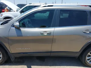 2019 Jeep Cherokee Latitude with VIN 1C4PJLCB7KD365667, listed as a IAAI auction lot 42504207 with 68,106 mi miles and . Bid and sale history available at DreamBid. Image 14.