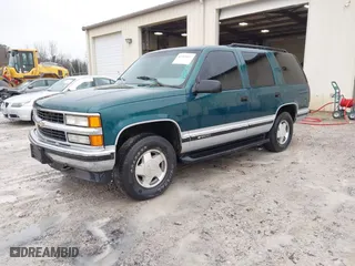 1996 Chevrolet Tahoe with VIN 1GNEK13R1TJ388054, listed as a IAAI auction lot 41368047 with 155,138 mi miles. Bid and sale history available at carsss.com. Image 2.