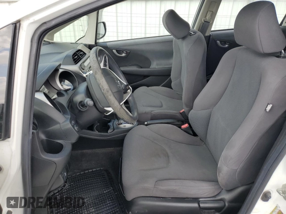 2013 Honda Fit с VIN JHMGE8H36DC045573, выставлен на аукционе Copart как лот 59525075 с пробегом 91 355 миль миль и Списание • Salvage title. История ставок и продаж доступна на DreamBid. Изображение 7.