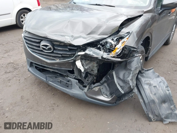 2016 Mazda CX-5 Sport with VIN JM3KE4BY8G0895209, listed as a IAAI auction lot 41688405 with 115,954 mi miles. Bid and sale history available at carsss.com. Image 6.