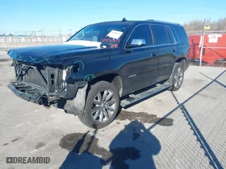 2015 Chevrolet Tahoe LTZ with VIN 1GNSCCKC8FR581994, listed as a IAAI auction lot 41406219 with 187,802 mi miles. Bid and sale history available at carsss.com. Image 17.