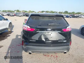 2020 Ford Edge Titanium with VIN 2FMPK3K94LBB37706, listed as a IAAI auction lot 42524373 with 77,849 mi miles and . Bid and sale history available at DreamBid. Image 16.