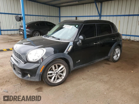 2014 MINI Countryman S with VIN WMWZC5C56EWP38065, listed as a Copart auction lot 59518395 with 91,106 mi miles and Salvage title. Bid and sale history available at DreamBid. Image 1.