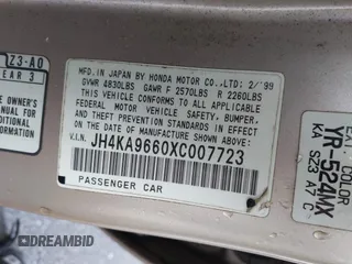1999 Acura RL with VIN JH4KA9660XC007723, listed as a IAAI auction lot 42039719 with Not provided miles and . Bid and sale history available at DreamBid. Image 9.