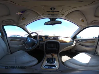 2003 Jaguar S-Type with VIN SAJEA01T13FM70486, listed as a IAAI auction lot 41989501 with 100,109 mi miles and . Bid and sale history available at DreamBid. Image 18.