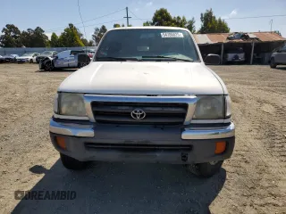 1999 Toyota Tacoma PreRunner with VIN 4TASN92N8XZ465120, listed as a Copart auction lot 54786825 with 320,970 mi miles and Salvage title. Bid and sale history available at DreamBid. Image 5.