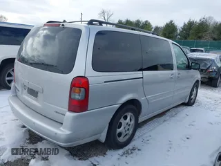 2003 Oldsmobile Silhouette GL z VIN 1GHDX03EX3D186240, wystawiony jako IAAI lot #41398449 z przebiegiem 143 669 mil mil oraz . Historia ofert i sprzedaży dostępna na DreamBid. Obrazek 4.