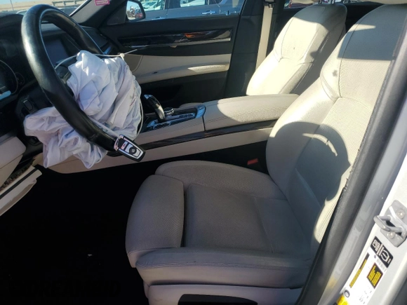 2014 BMW 7 Series 740Li with VIN WBAYE4C56ED138593, listed as a Copart auction lot 82010534 with 88,393 mi miles and Salvage Title. Bid and sale history available at carsss.com. Image 7.