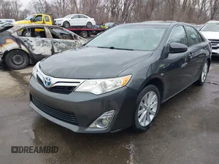 2012 Toyota Camry XLE z VIN 4T1BD1FK1CU048272, wystawiony jako IAAI lot #41711586 z przebiegiem 104 734 mil mil oraz . Historia ofert i sprzedaży dostępna na DreamBid. Obrazek 2.