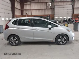 2015 Honda Fit EX-L z VIN 3HGGK5H86FM714030, wystawiony jako IAAI lot #42388380 z przebiegiem 197 414 mil mil oraz . Historia ofert i sprzedaży dostępna na DreamBid. Obrazek 13.