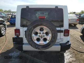 2013 Jeep Wrangler Sahara with VIN 1C4AJWBG0DL517849, listed as a Copart auction lot 58392505 with 119,499 mi miles and Clean title. Bid and sale history available at DreamBid. Image 6.