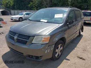 2010 Dodge Grand Caravan SE with VIN 2D4RN4DE6AR339734, listed as a IAAI auction lot 40086879 with 221,062 mi miles and . Bid and sale history available at DreamBid. Image 2.