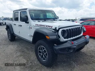 2024 Jeep Gladiator Rubicon z VIN 1C6JJTBG5RL110865, wystawiony jako IAAI lot #42104829 z przebiegiem 6 815 mil mil oraz . Historia ofert i sprzedaży dostępna na DreamBid. Obrazek 1.