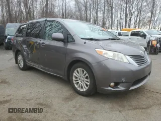 2014 Toyota Sienna XLE with VIN 5TDYK3DC1ES492724, listed as a Copart auction lot 51605245 with 112,079 mi miles and Salvage Title. Bid and sale history available at carsss.com. Image 4.