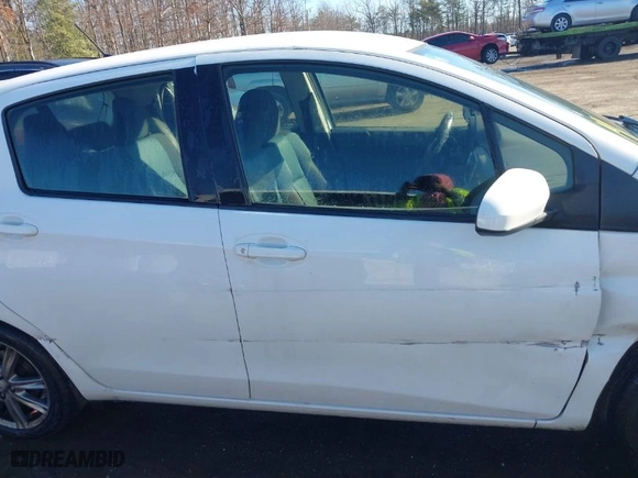 2014 Toyota Yaris L with VIN JTDKTUD31ED590687, listed as a IAAI auction lot 41190914 with 95,330 mi miles. Bid and sale history available at carsss.com. Image 13.