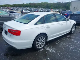 2014 Audi A6 Prestige with VIN WAUHGAFCXEN091050, listed as a IAAI auction lot 42524560 with 169,575 mi miles and . Bid and sale history available at DreamBid. Image 4.