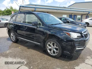 2017 Subaru Forester Touring z VIN JF2SJAWCXHH431232, wystawiony jako Copart lot #61625265 z przebiegiem 67 280 mil mil oraz Szkoda całkowita • Salvage title. Historia ofert i sprzedaży dostępna na DreamBid. Obrazek 4.