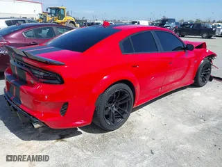 2022 Dodge Charger Scat Pack with VIN 2C3CDXGJ7NH229307, listed as a IAAI auction lot 41808821 with 12,184 mi miles. Bid and sale history available at carsss.com. Image 4.