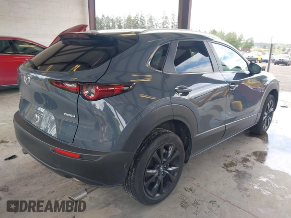 2023 Mazda CX-30 S Carbon Edition with VIN 3MVDMBCM1PM558865, listed as a IAAI auction lot 42298416 with 19,276 mi miles and . Bid and sale history available at DreamBid. Image 4.