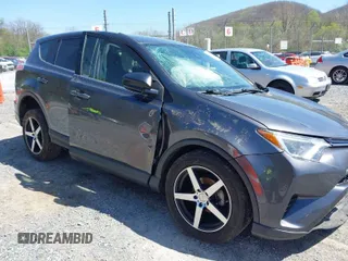 2018 Toyota RAV4 LE with VIN JTMBFREV0JJ722483, listed as a IAAI auction lot 41982973 with 83,012 mi miles. Bid and sale history available at carsss.com. Image 1.