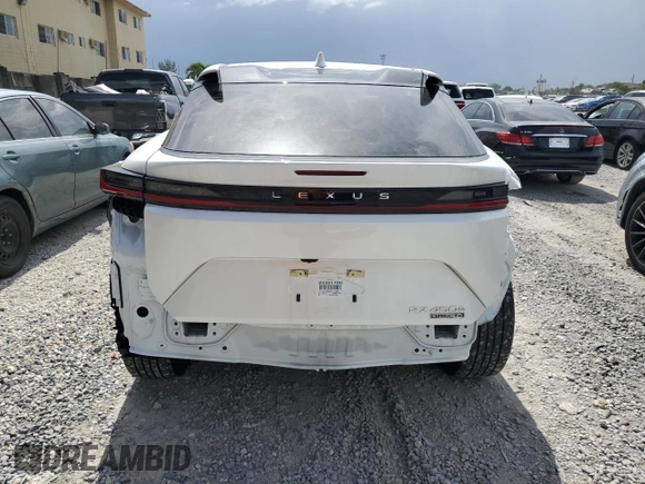 2023 Lexus RZ 450e Premium z VIN JTJAAAAB9PA011698, wystawiony jako Copart lot #64390964 z przebiegiem 12 303 mil mil oraz Szkoda całkowita • Salvage title. Historia ofert i sprzedaży dostępna na DreamBid. Obrazek 6.