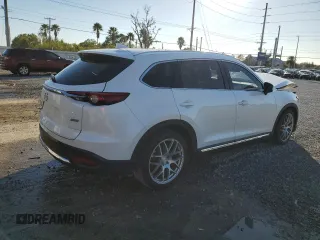 2017 Mazda CX-9 Grand Touring z VIN JM3TCADYXH0127867, wystawiony jako Copart lot #82352204 z przebiegiem 129 349 mil mil oraz Szkoda całkowita • Salvage title. Historia ofert i sprzedaży dostępna na DreamBid. Obrazek 3.