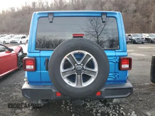 2022 Jeep Wrangler Unlimited Sahara z VIN 1C4HJXEG3NW246088, wystawiony jako Copart lot #50167185 z przebiegiem 16 074 mil mil oraz Nie do naprawy • Non repairable. Historia ofert i sprzedaży dostępna na DreamBid. Obrazek 6.