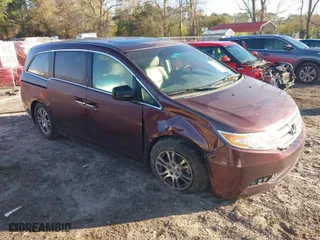 2012 Honda Odyssey EX-L with VIN 5FNRL5H60CB096691, listed as a IAAI auction lot 41824395 with 93,047 mi miles. Bid and sale history available at carsss.com. Image 1.