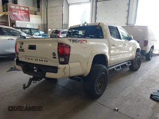 2018 Toyota Tacoma SR with VIN 3TMCZ5AN0JM164924, listed as a IAAI auction lot 41754508 with 59,038 mi miles. Bid and sale history available at carsss.com. Image 4.