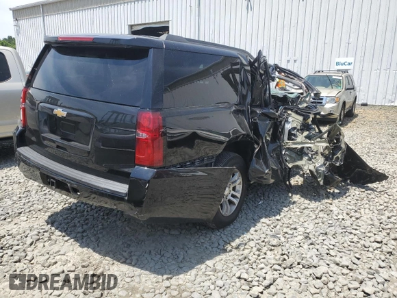 2019 Chevrolet Suburban LT with VIN 1GNSKHKC6KR202548, listed as a Copart auction lot 60195714 with 156,087 mi miles and Salvage Title. Bid and sale history available at DreamBid. Image 3.